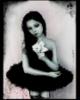 Gothic ballerina holding flower